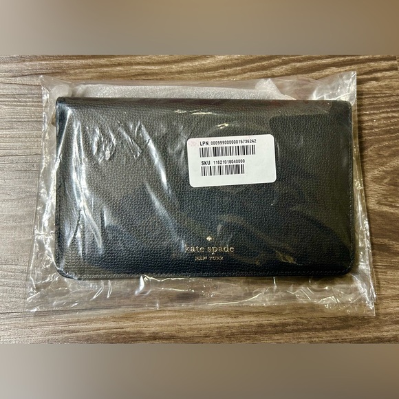 Kate Spade New York
Darcy Leather Clutch Wallet Wristlet - Picture 10 of 10